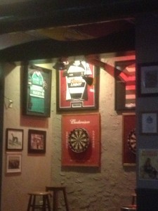 Some framed rugby jerseys where you can play some darts