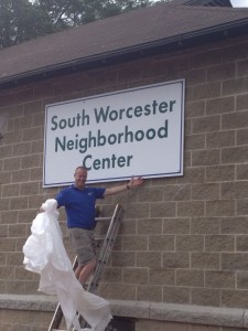 Bill with new sign for neighborhood center